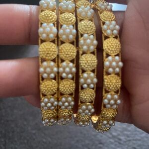 Elegant Gold and Pearl Women's Bangles